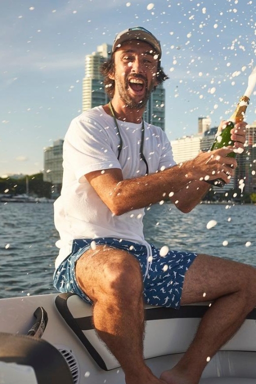 1 hour Miami Private Boat Ride with champagne and captain - Onboard perks: cooler, music, ponchos, life jackets