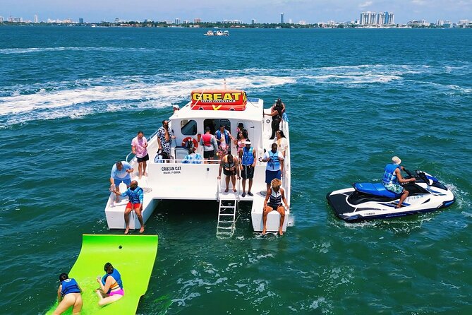 3 Hour Party Boat Jet ski Banana Tube and open bar in Miami - The Party Boat Deck: Music, Drinks, and the Right Kind of Chaos