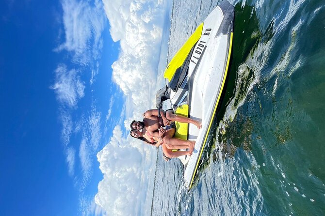 AquaFusion Combo: Jet Ski + Party Boat Excursion - Party boat interlude: snacks, soda, and BYOB on calmer water