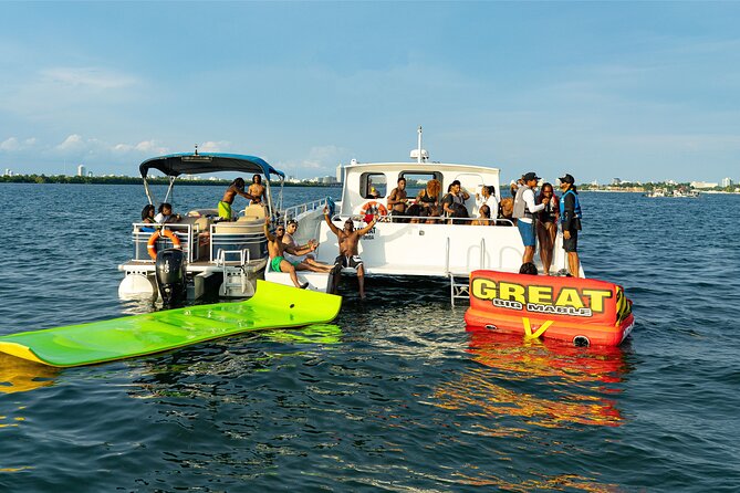 Aquatic Adventure: Boat Tour with Jetskis, Tubing, and Open Bar - The boat outing: catamaran vibe plus a jet boat burst