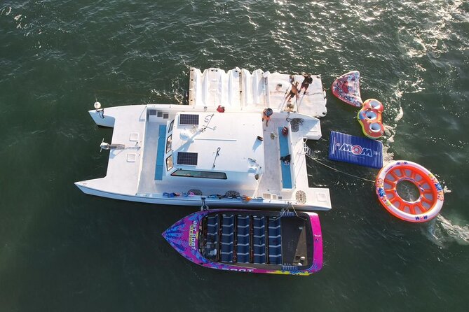 Aquatic Adventure: Boat Tour with Jetskis, Tubing, and Open Bar - Tubing and the water mat: for splash lovers who want less pressure