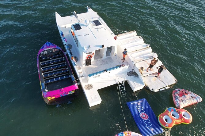 Aquatic Adventure: Boat Tour with Jetskis, Tubing, and Open Bar - The party platform: open bar energy with actual hanging time