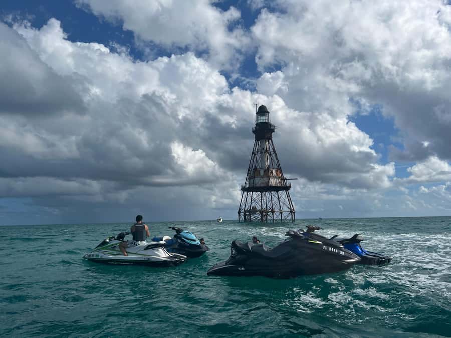Best Jet Ski Rental in Miami with Free Boat Ride - Speedboat comfort: shade under the Sun Top on the aft deck