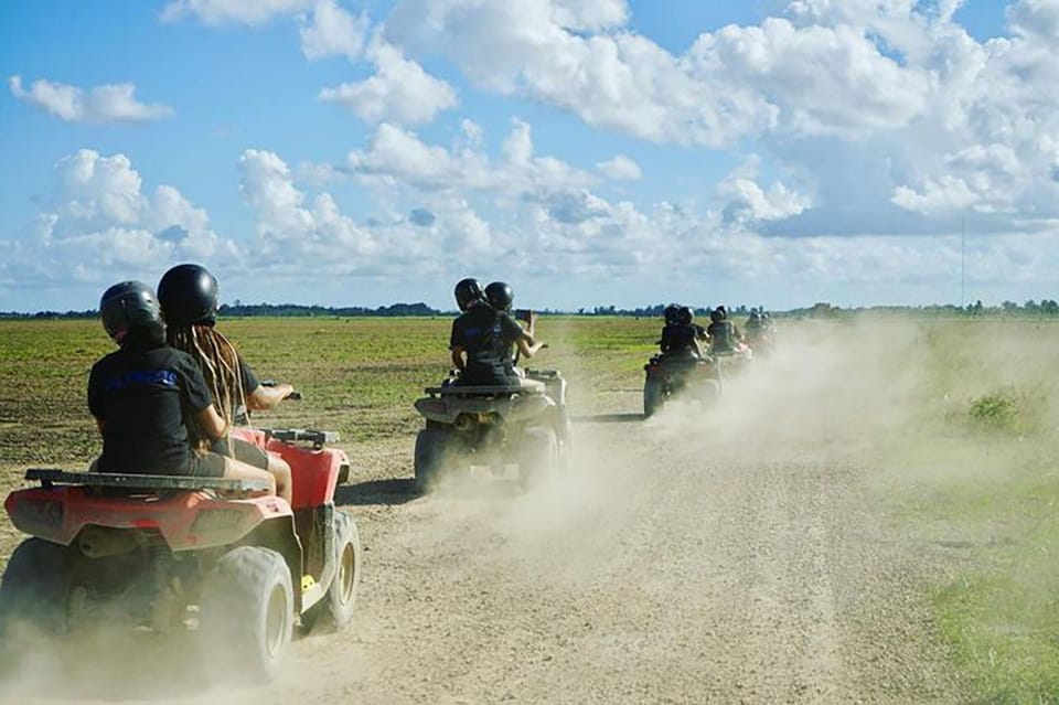 Best-Selling Miami ATV: Day or Night Ride w/ FREE Pics+Video - Homestead trails: dirt roads, puddles, and rocky sections