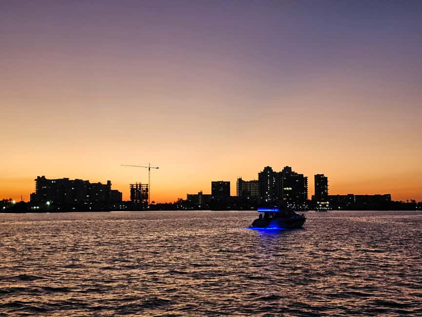From North Bay Village: Private Boat Party with Champagne - Haulover Sandbar Stop: Swim, Locals, and That Wind-in-Your-Hair Feeling