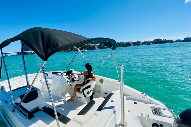 Fun Boat Rental with Captain in Miami Beach - up to 6 people - What You Actually Get: Floating Mat, Cooler, Bluetooth, and Safety Gear