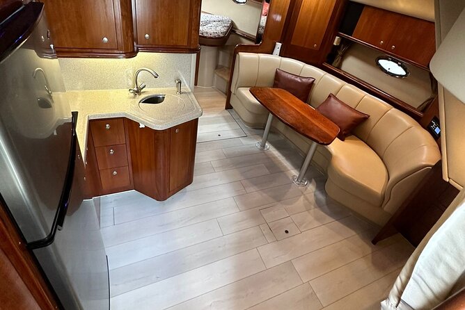 Island Fun Yacht Rental in Miami Beach - Comfort on Board: AC Cabin, Bathroom, and a Real Kitchen