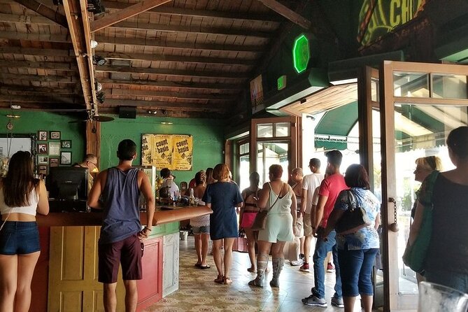 Little Havana Cuban Food Tour For Corporate Groups - The cigar store stop: watching master rollers at Hecho a mano