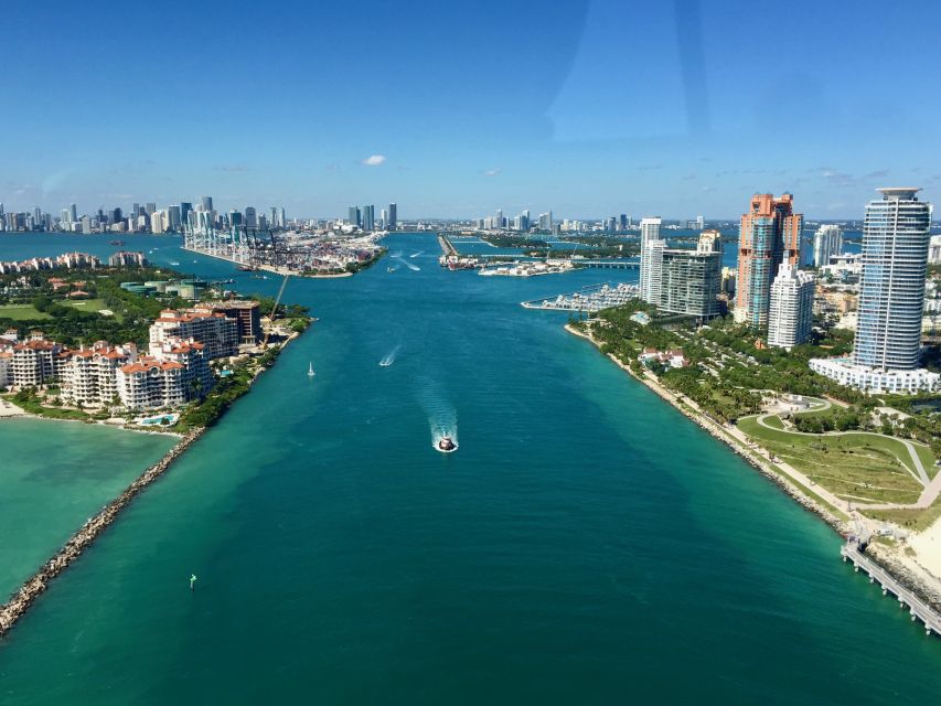 Miami: Guided Small Group Boat Tour + Iconic Stiltsville - Cape Florida Lighthouse and Key Biscayne mansions: history meets jaw-dropping views
