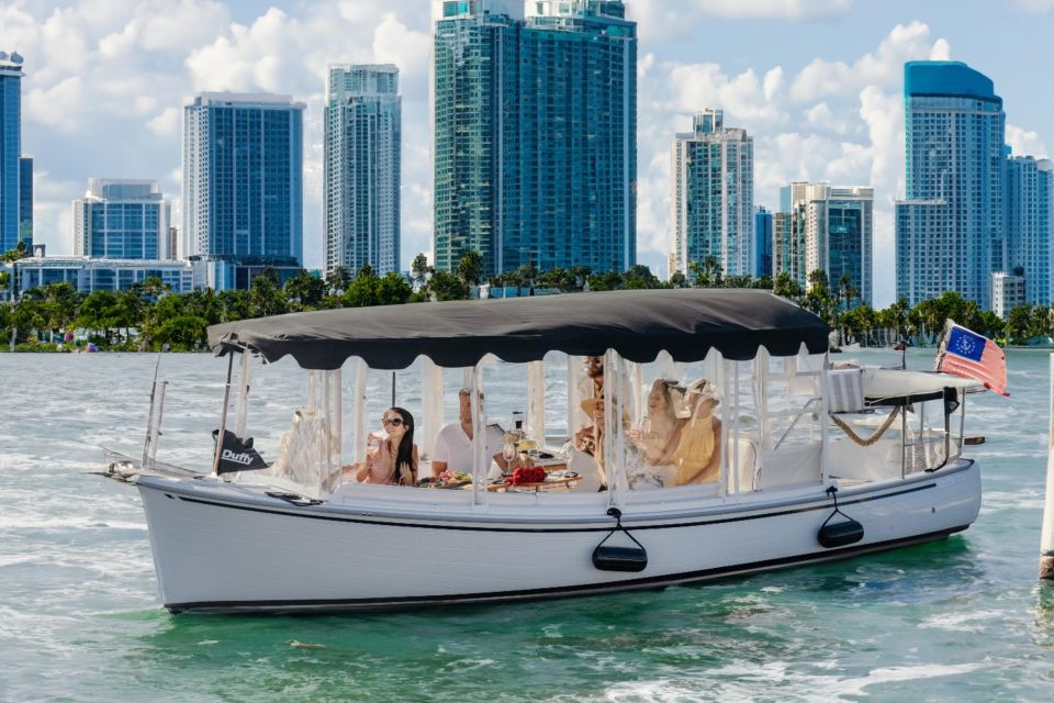 Miami: Luxury E-Boat Cruise with Wine and Charcuterie Board - Wine and Charcuterie: How the On-Water Snack Time Works