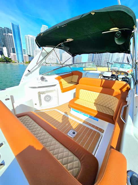 Miami: Private Boat Cruise and Tour with Captain - The on-board experience: cooler, water, bathroom, and music