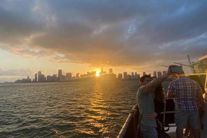 Miami Sunset Biscayne Bay and South Beach Cruise - Onboard Experience: Guides, Heat, and the Cash Bar