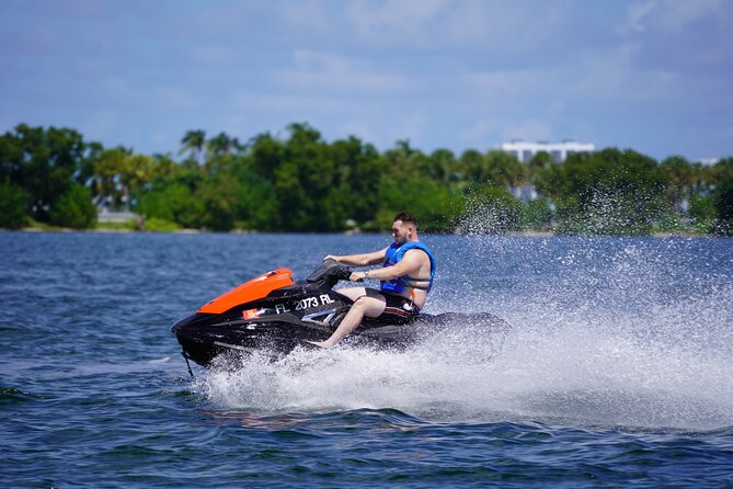Ride the waves of Miami Bay with brand new Jet Skis - Safety basics: life jackets and instructors nearby