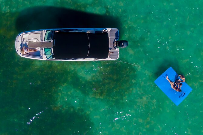 Top-Rated Boat Rental with Captain | 1 to 11 People - Swim Time on the 10-Foot Floating Mat in Warm Biscayne Bay