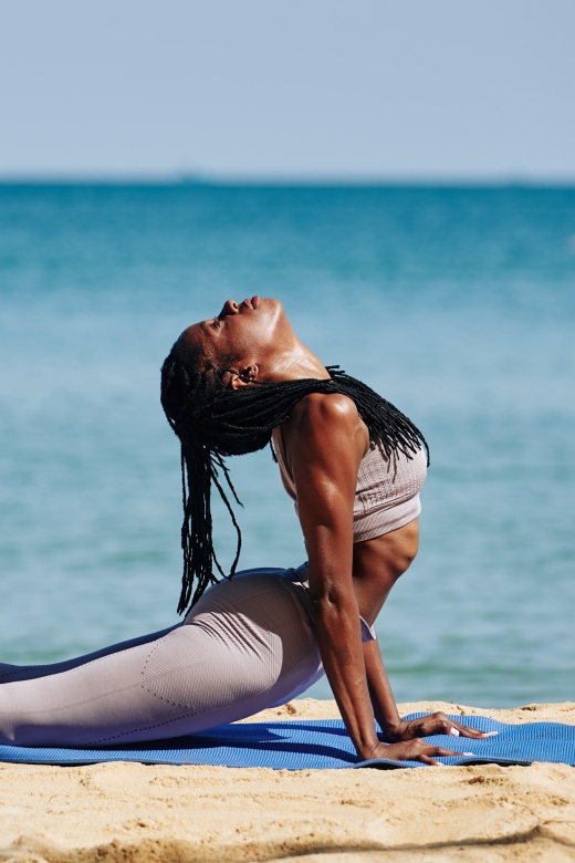 Yoga on the Beach in South Beach - Who Leads It: Damien’s Mix of Relaxing Flow and Yoga Philosophy